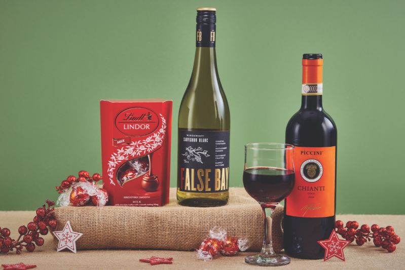 Christmas hamper containing wine and chocolates